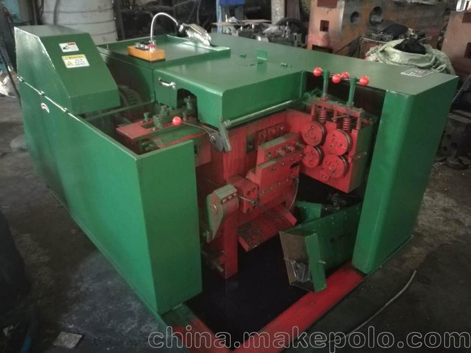 供應生產(chǎn)謝兵機械MD4-4S-40L全自動(dòng)冷鐓機 鉚釘機 箱包鉚釘機圖片