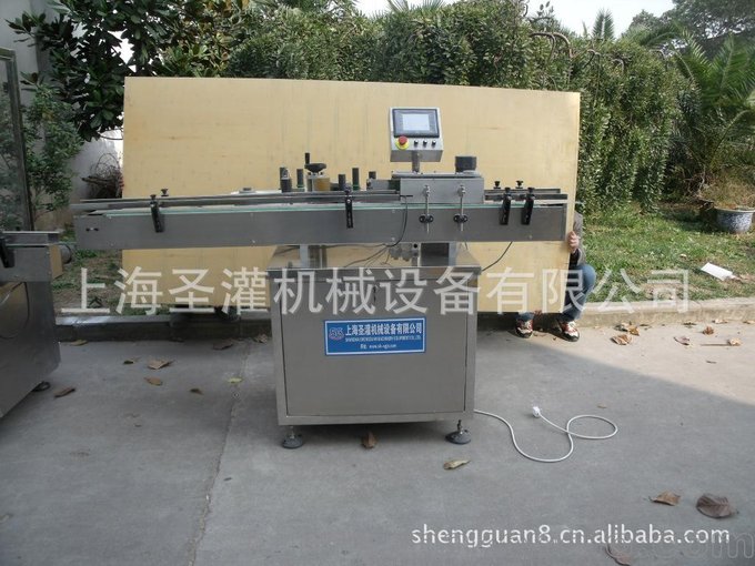 貼標(biāo)機(jī)，全自動方瓶貼標(biāo)機(jī)，全自動圓瓶立式貼標(biāo)打碼機(jī)。圖片