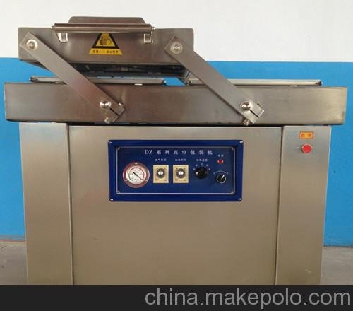 供應(yīng)旭康牌DZ-400/2S型烤豬蹄真空包裝機(jī) 各種熟食包裝機(jī)圖片