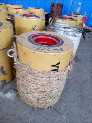 伊犁州 數(shù)控智能張拉機(jī) 鋼絞線張拉穿心式千斤頂圖片